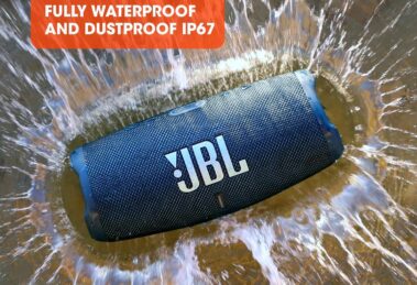 a JBL speaker in water with text above it